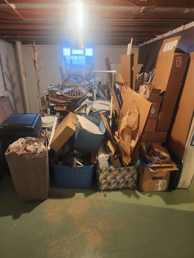 Roll-off dumpster container at job site for Roll Off Dumpster Rental in Ishpeming